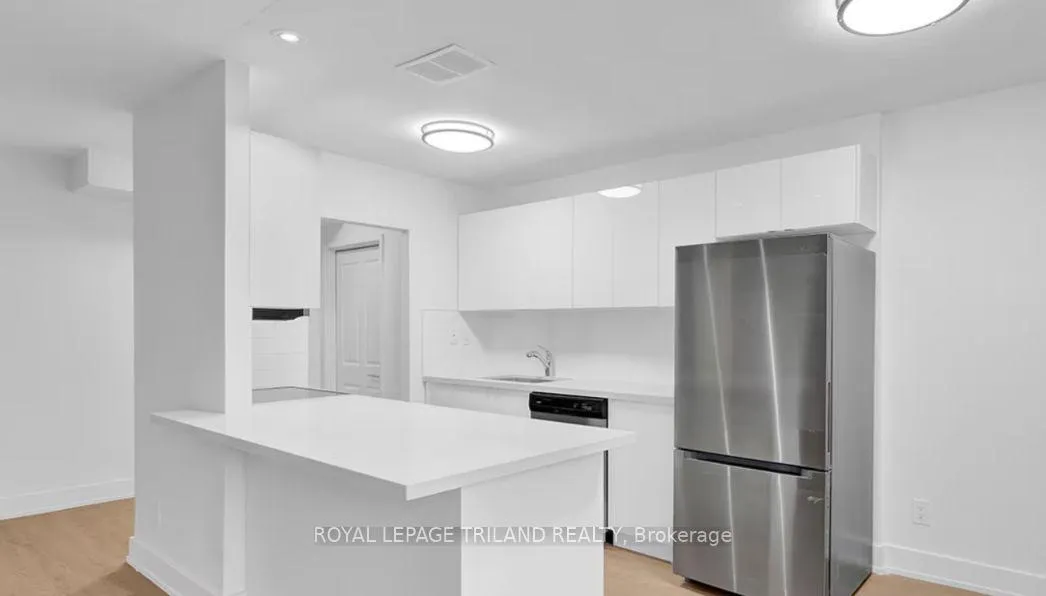 Photo 2 of Unit 402, 671 Woolwich Street, Guelph, Riverside Park — HOMEH