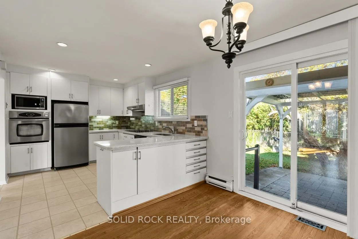 Photo 10 of 26 A & B Ettrick Crescent, Ottawa, Barrhaven - Pheasant Run — HOMEH