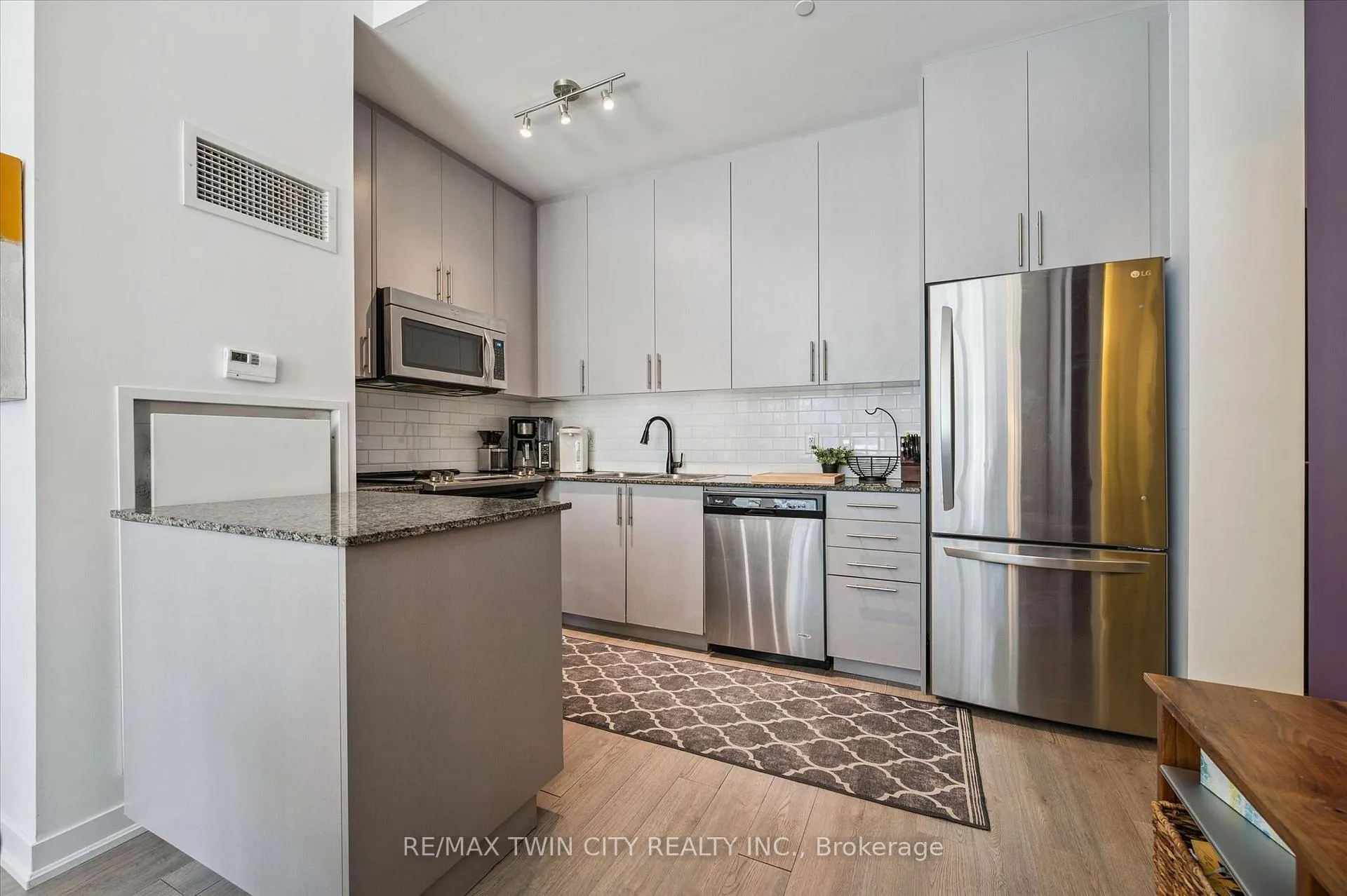 Photo 4 of Unit 103, 85 Duke Street W, Kitchener, City Commercial Core — HOMEH