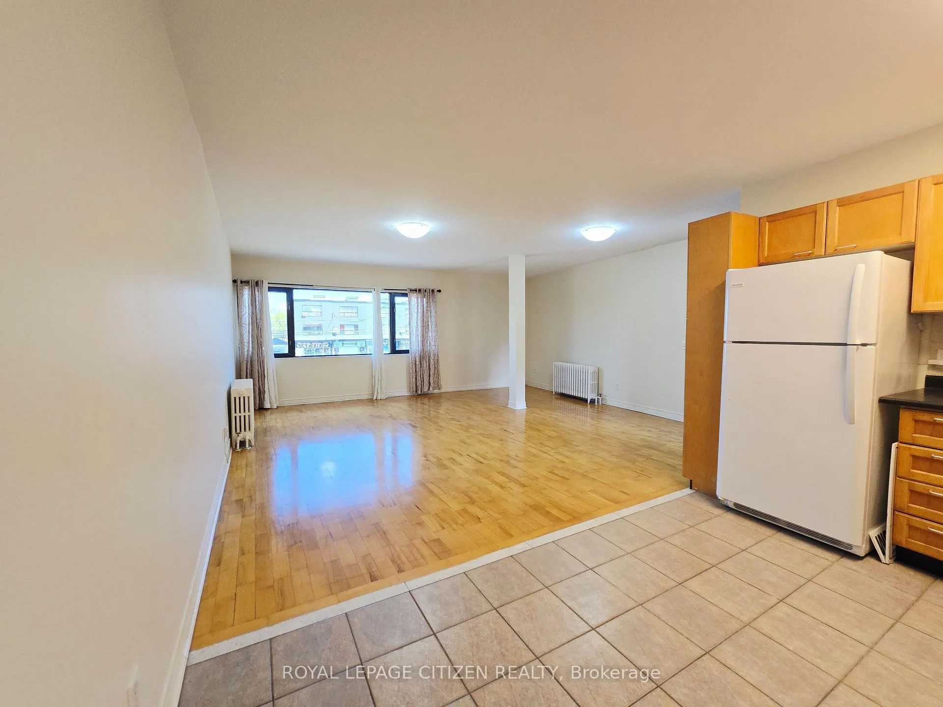Photo 2 of Unit Apt 2, 5317 Highway 7, Vaughan, West Woodbridge — HOMEH