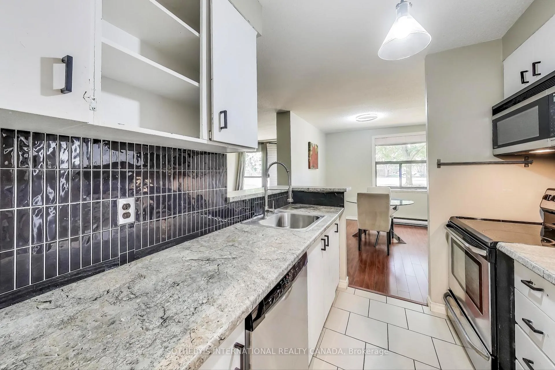 Photo 11 of Unit 104, 10 Ajax Street, Guelph, Junction/Onward Willow — HOMEH