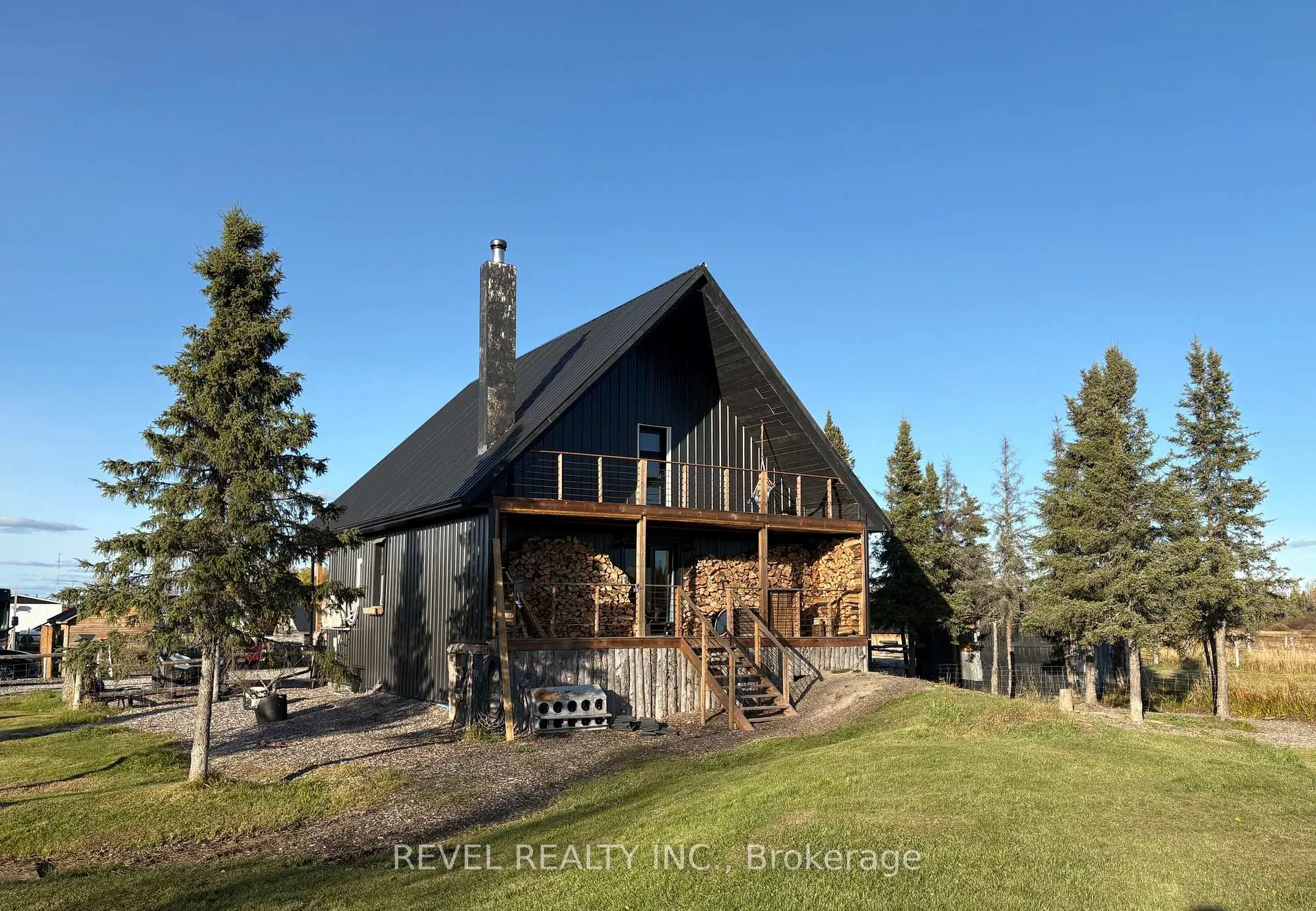 Photo 1 of 680 Peltola Road, Cochrane — HOMEH