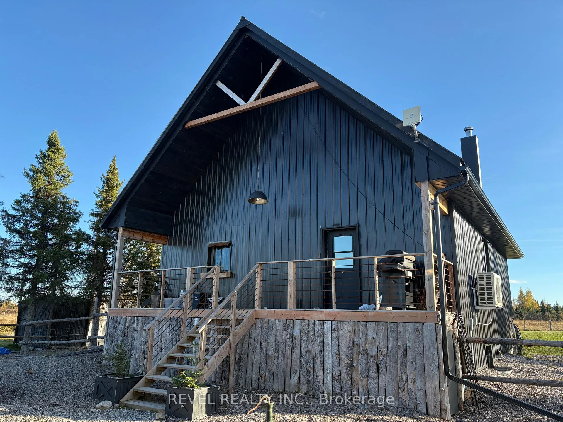Photo 2 of 680 Peltola Road, Cochrane — HOMEH
