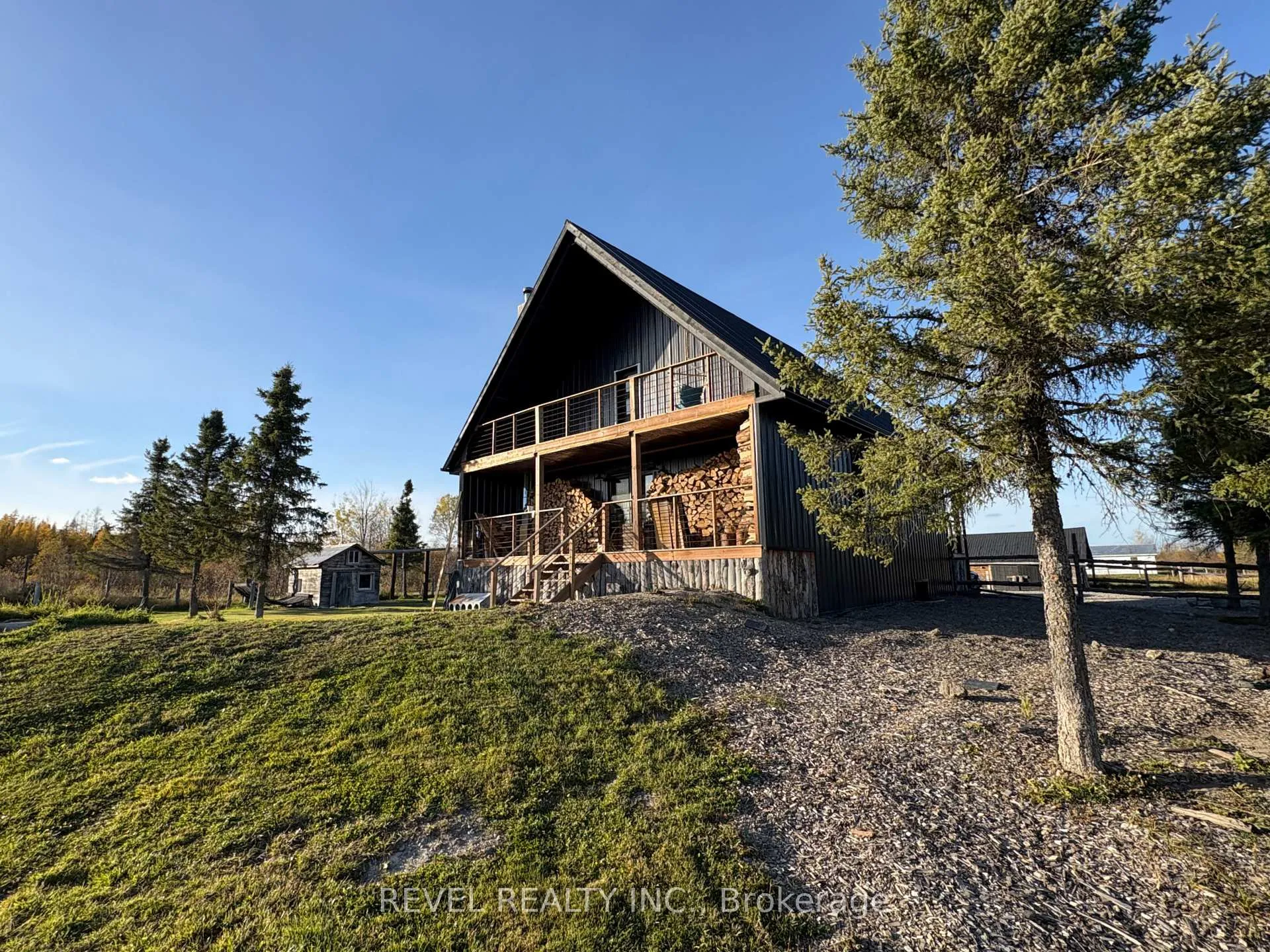 Photo 4 of 680 Peltola Road, Cochrane — HOMEH