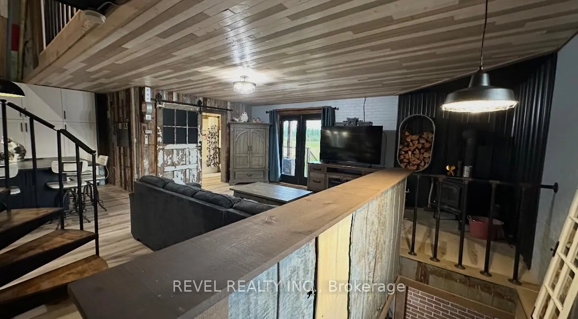 Photo 16 of 680 Peltola Road, Cochrane — HOMEH