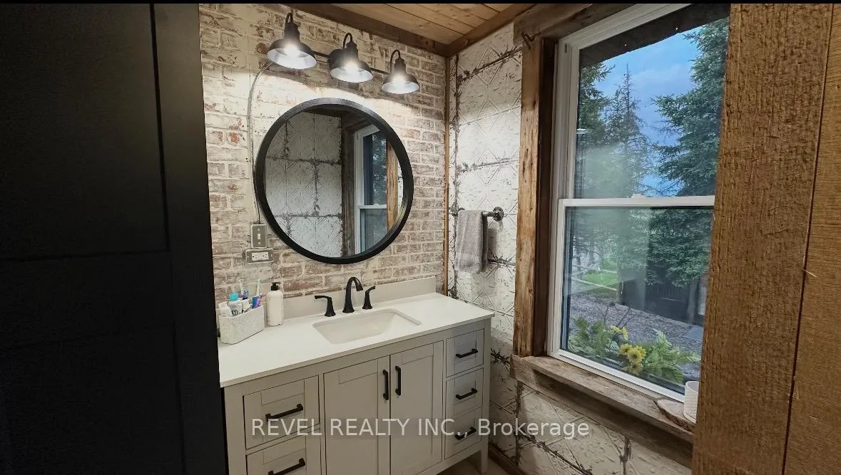 Photo 19 of 680 Peltola Road, Cochrane — HOMEH