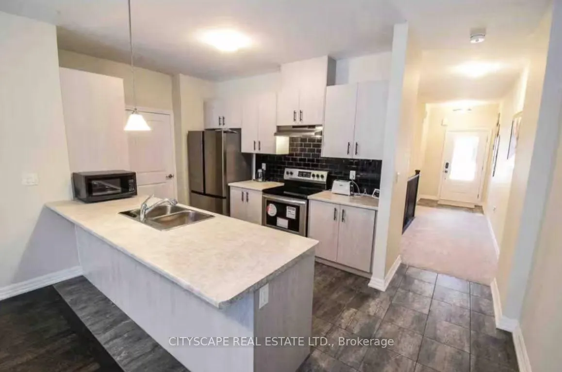 Photo 4 of Unit 13, 4311 Mann Street, Niagara Falls, Lyons Creek — HOMEH