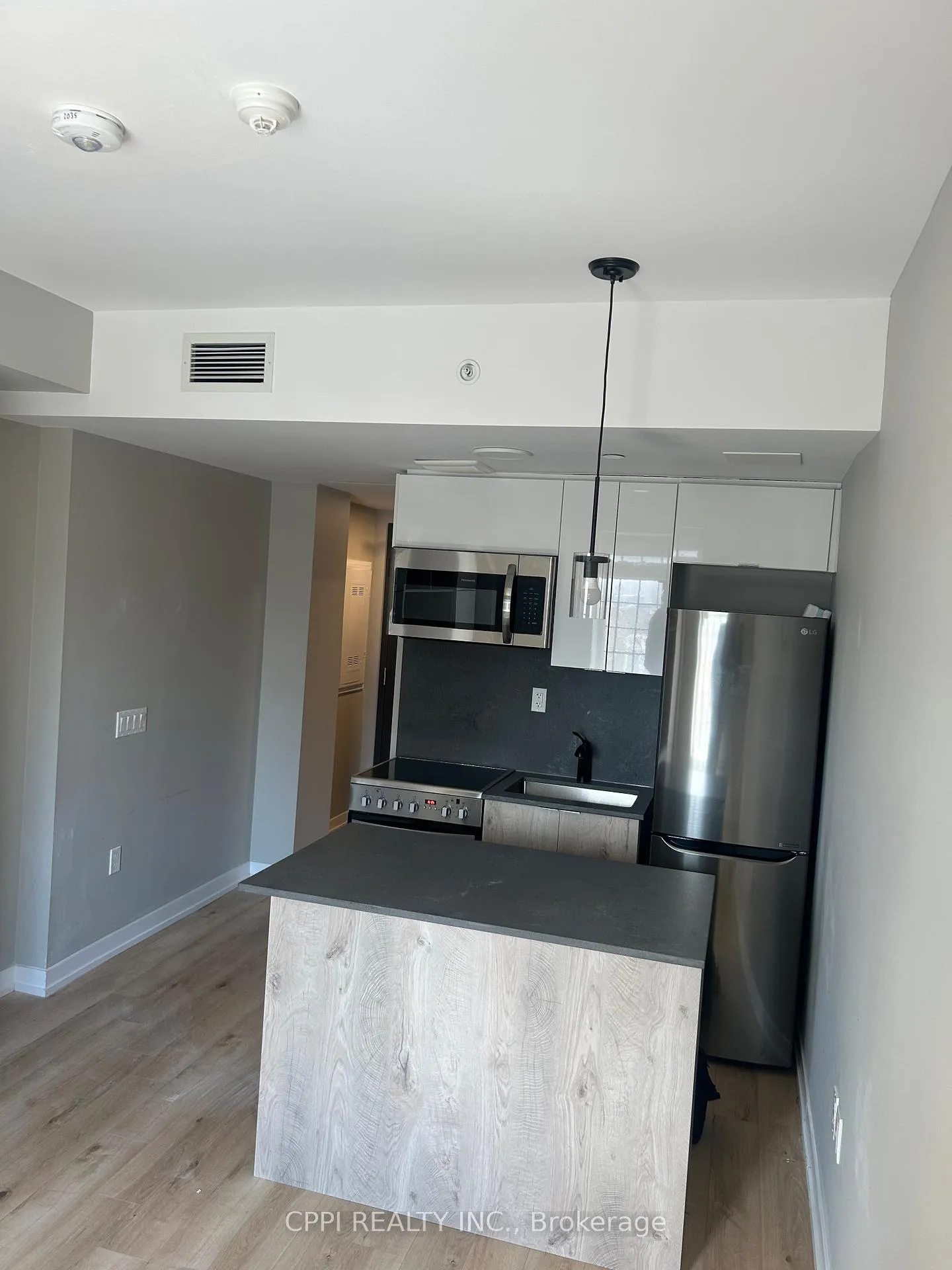 Photo 3 of Unit 211, 70 King Street E, Oshawa, Central — HOMEH