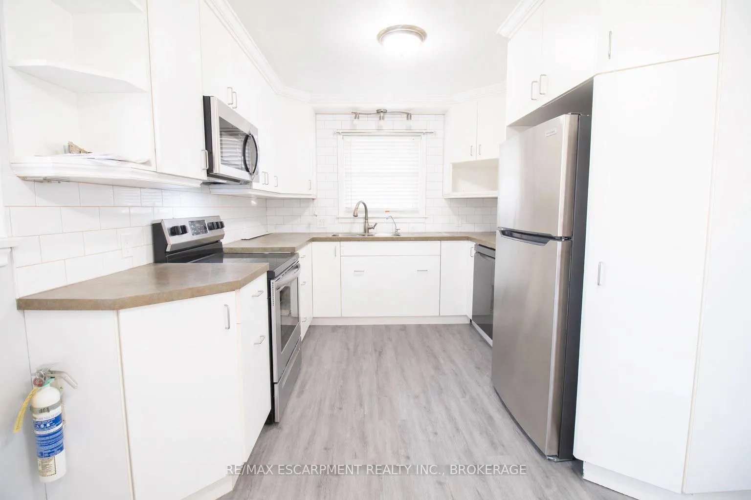 Photo 6 of Unit 1, 98 James Street E, Welland, Dain City — HOMEH