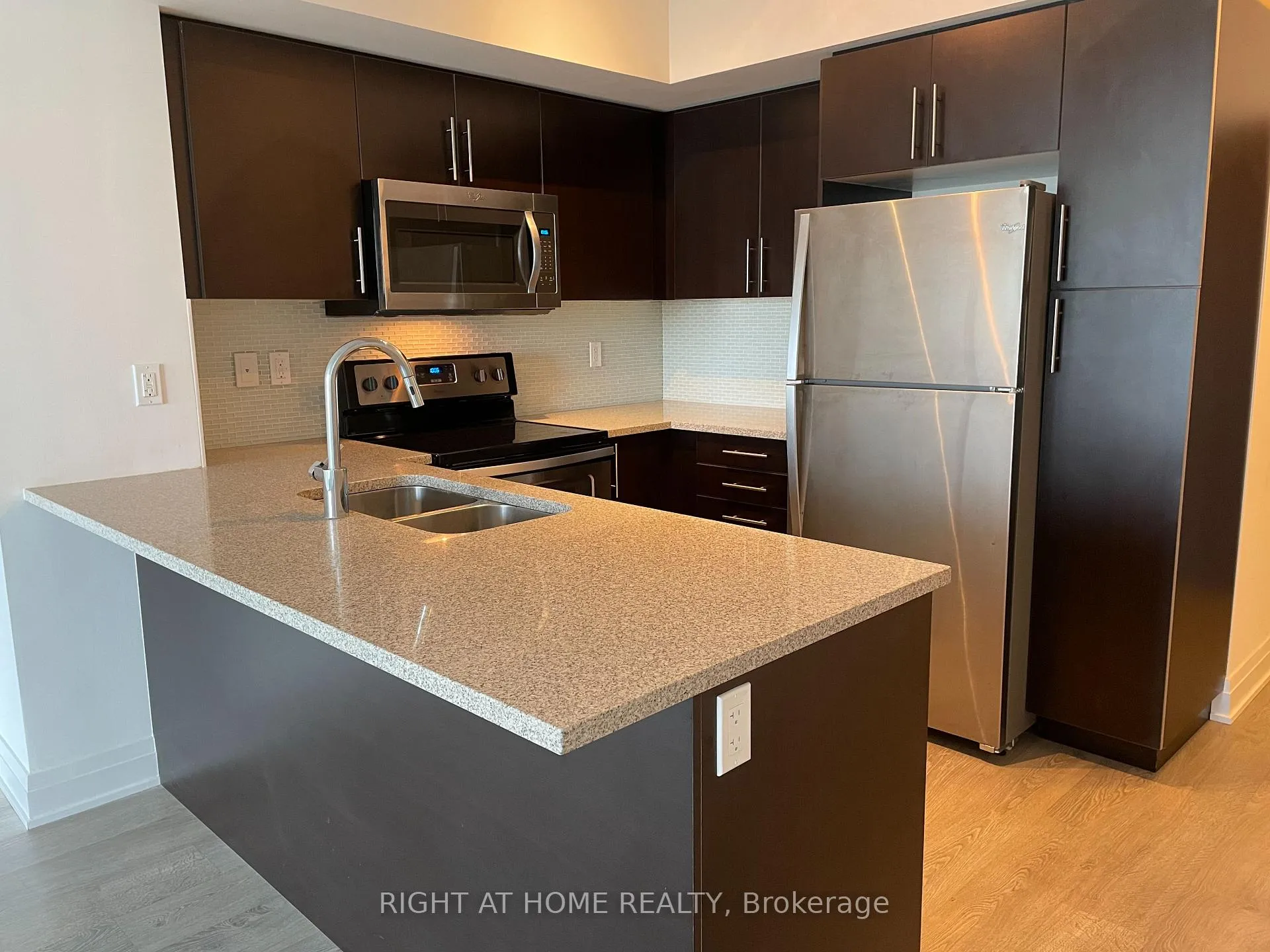 Photo 3 of Unit 410, 55 Speers Road, Oakville, Central — HOMEH