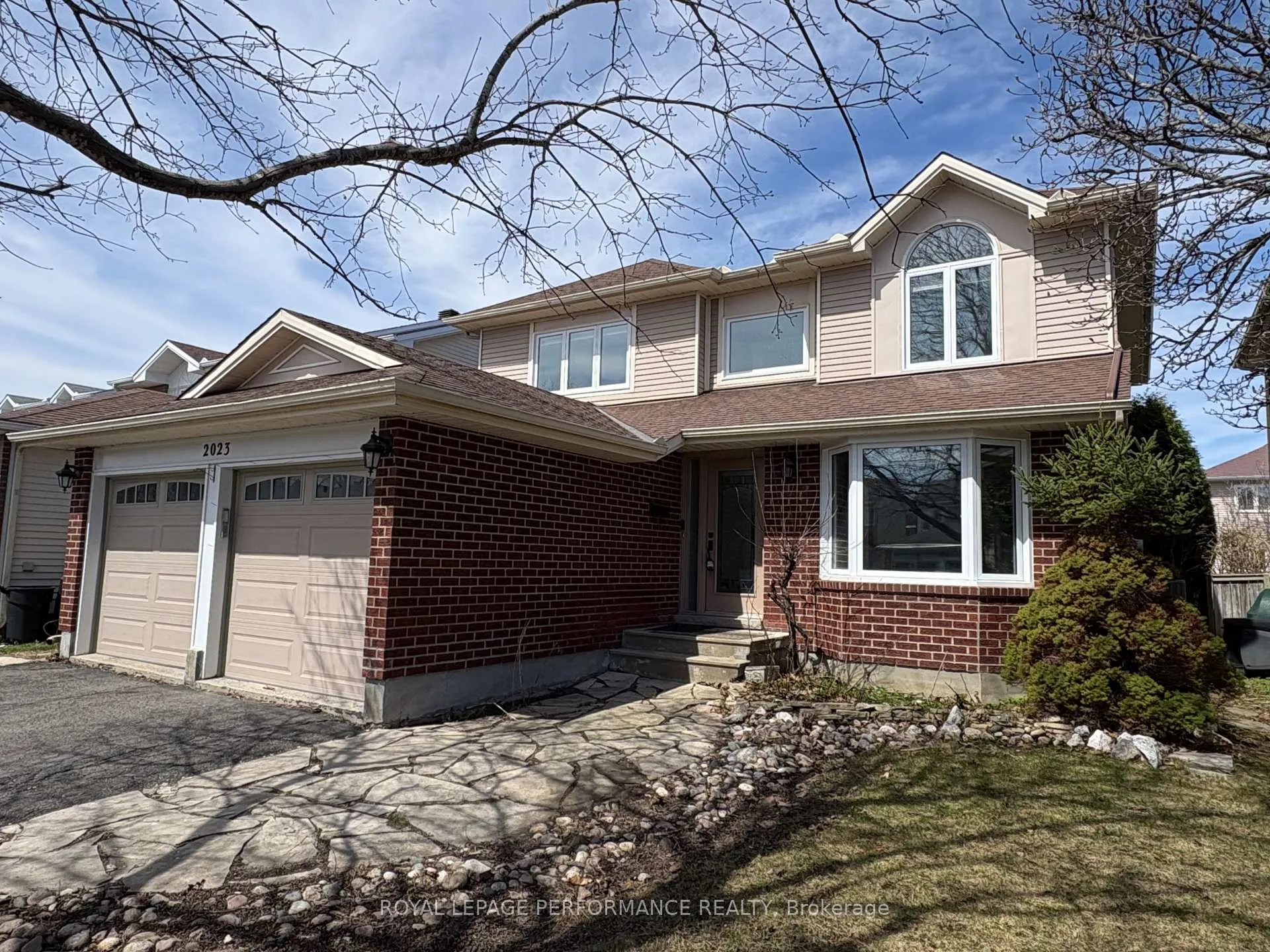 Front of 2023 Rolling Brook Drive