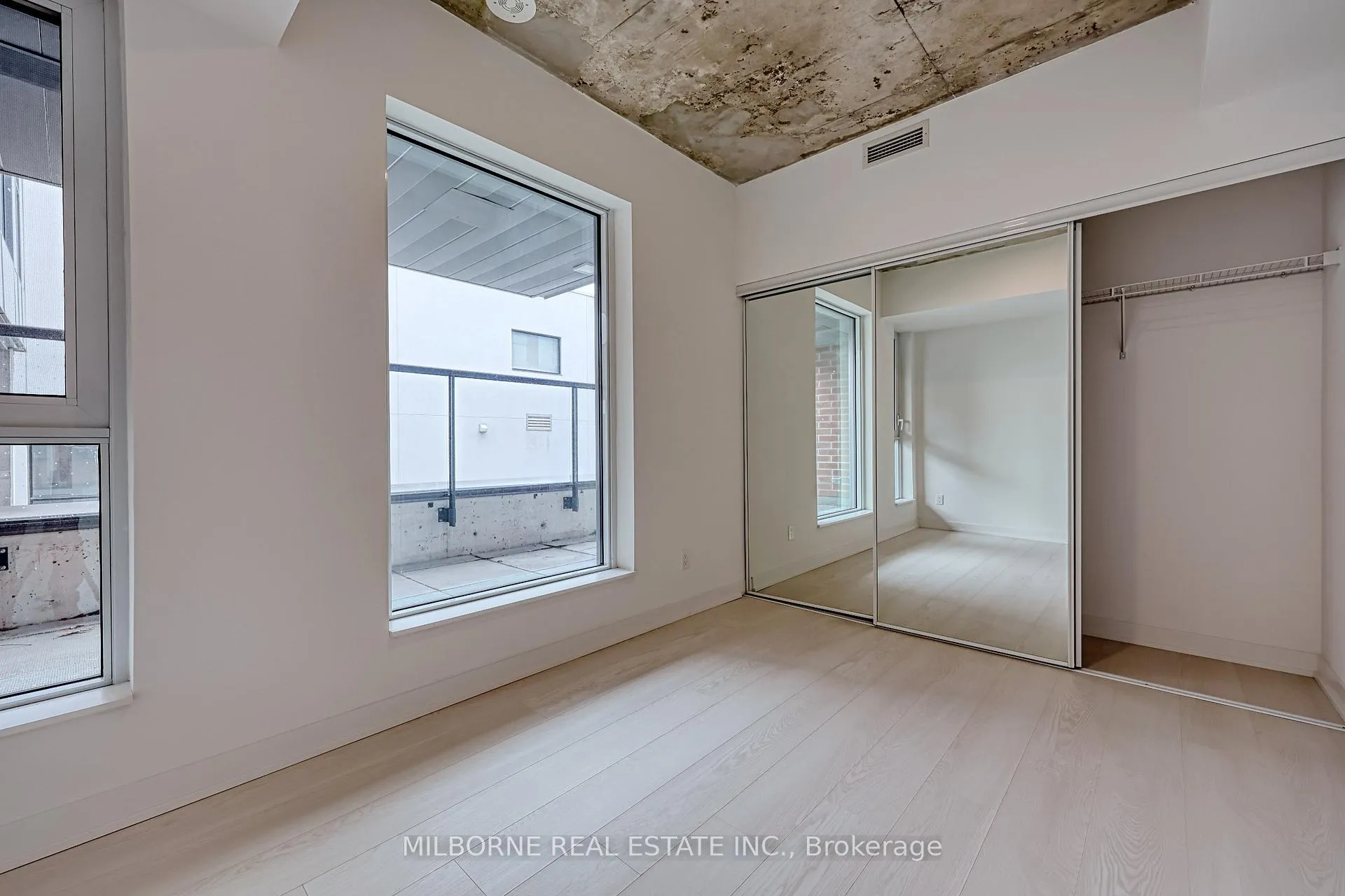 Photo 8 of Unit 104, 57 Brock Avenue, Toronto, Roncesvalles — HOMEH