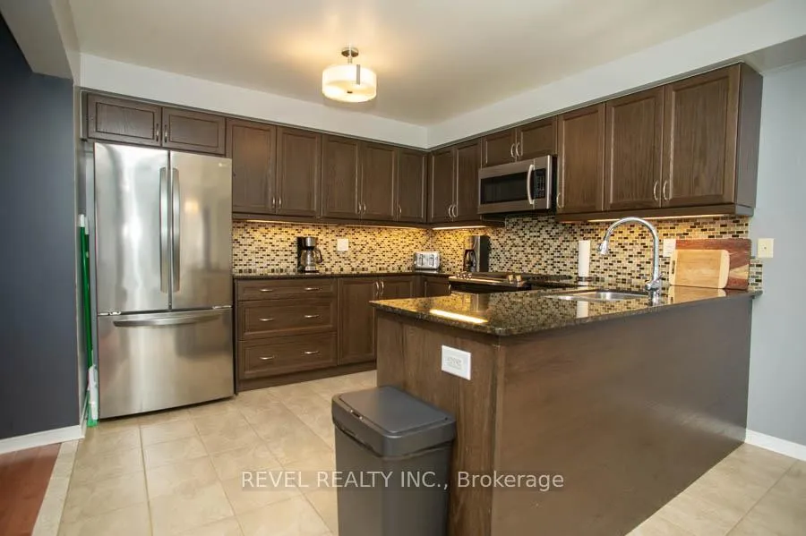 Photo 12 of 28 Barrett Avenue, Brantford — HOMEH