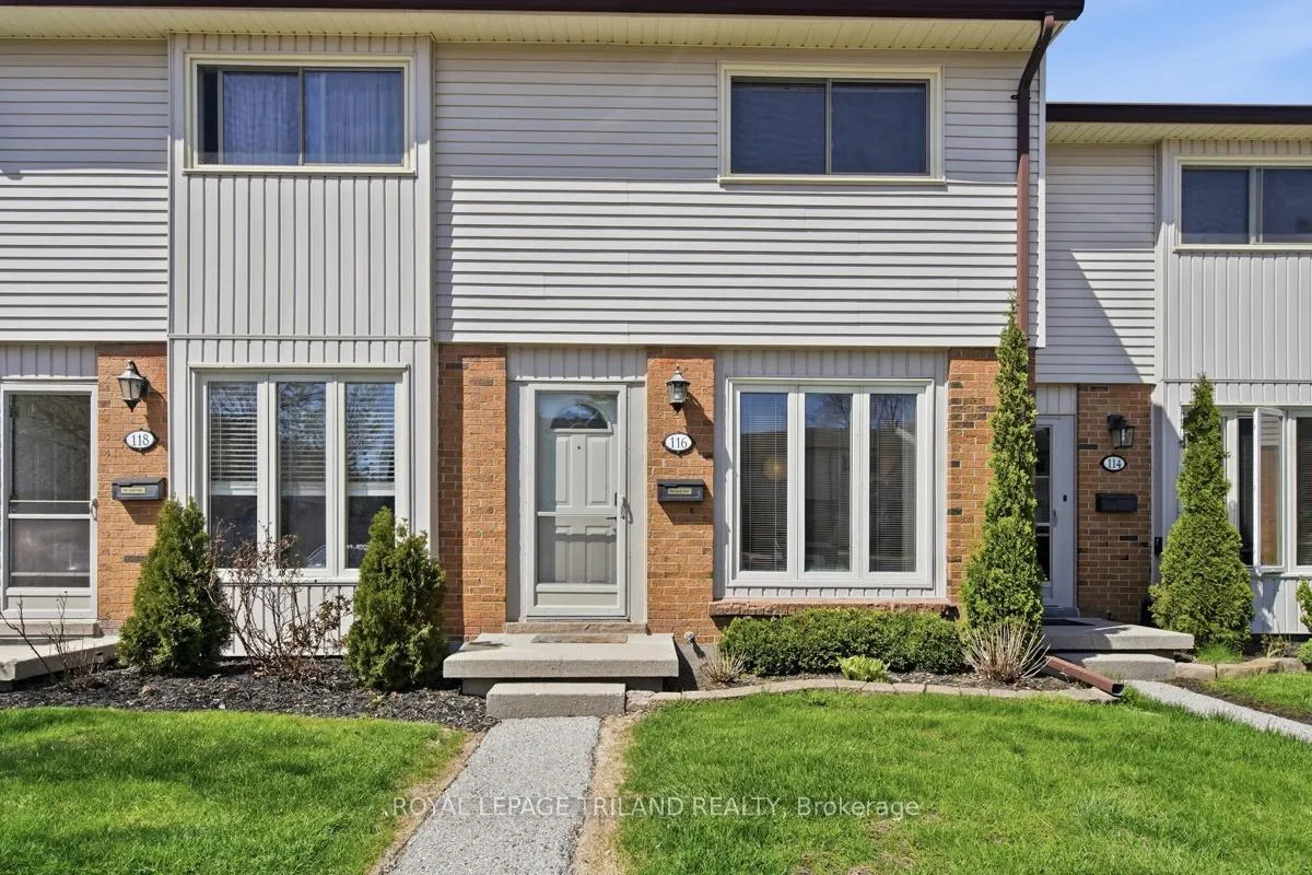 Front of Unit 116, 1328 Commissioners Road W