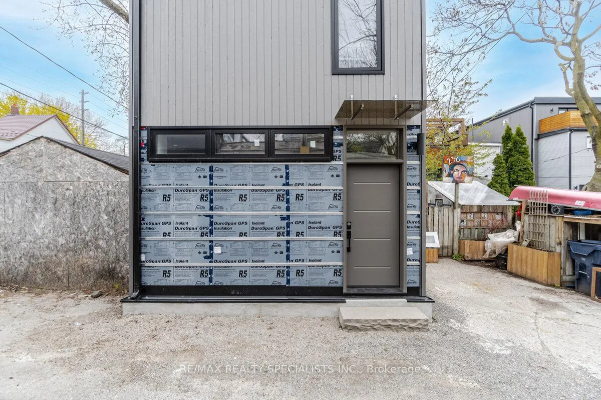 Front of Unit Coach, 238 Pape Avenue
