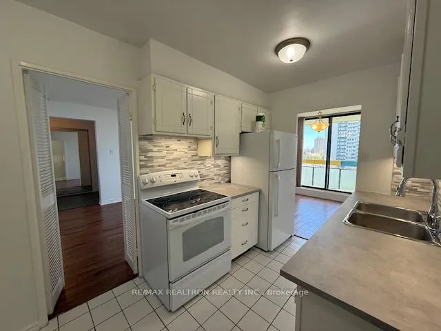 Photo 12 of Unit 1415, 177 Linus Road, North York, Hillcrest Village — HOMEH