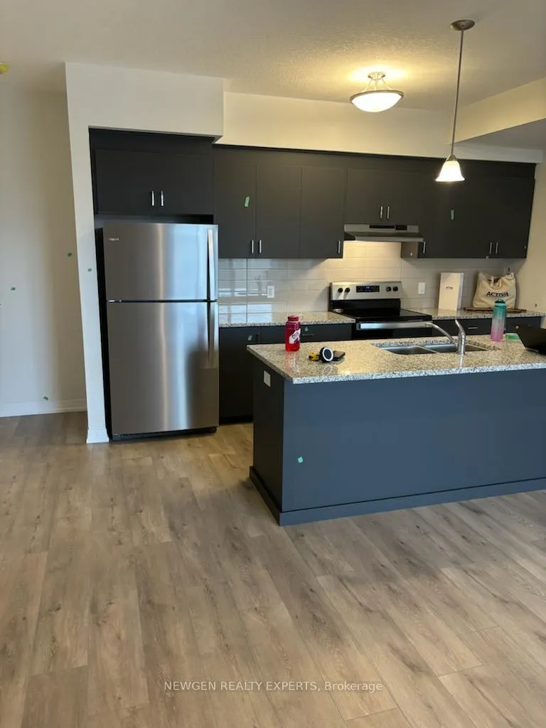 Photo 1 of Unit E018, 261 Woodbine Ave, Kitchener, Huron Park — HOMEH