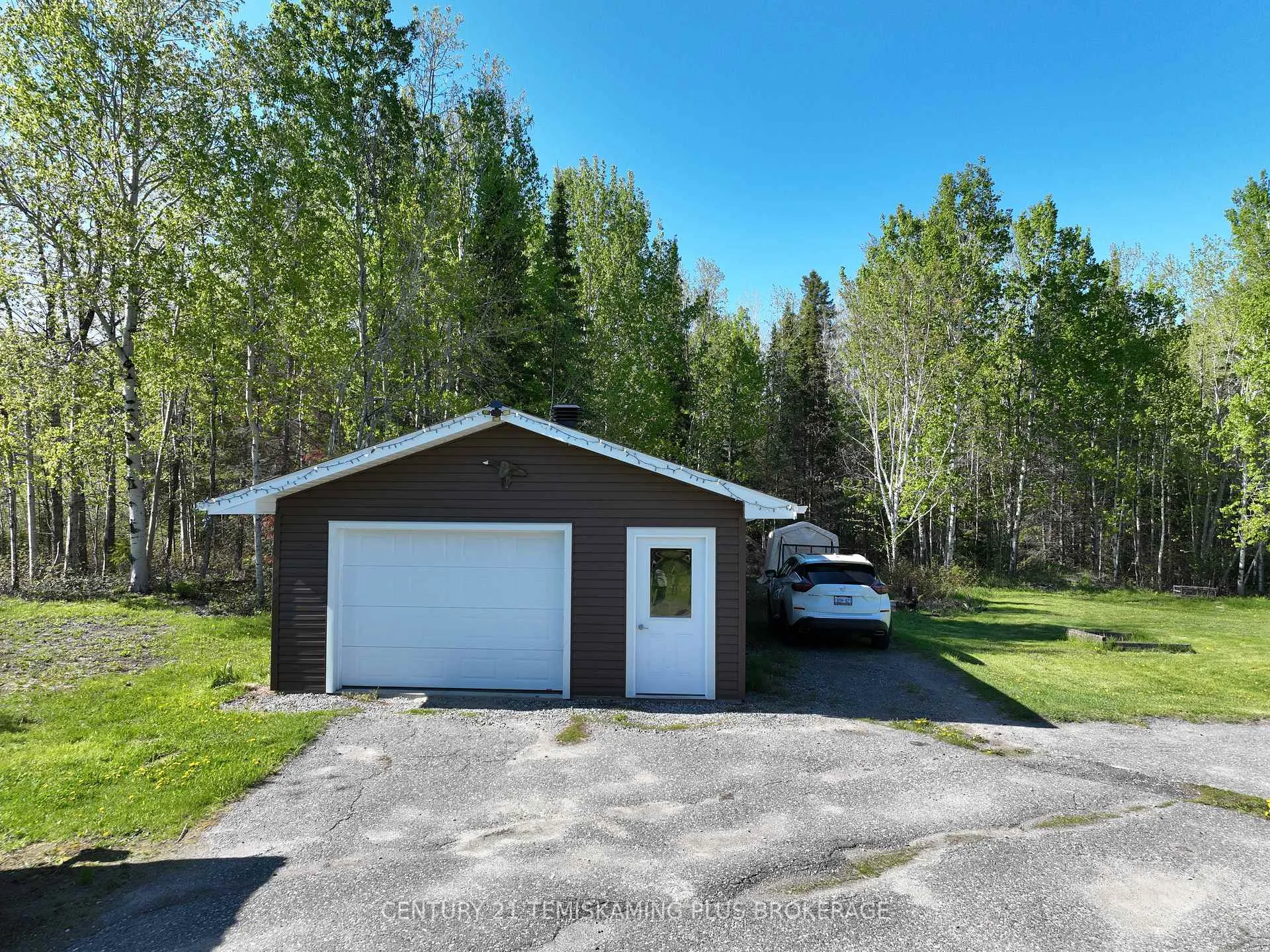Photo 4 of 974641 567 Highway, Timiskaming, TIM - Outside - Rural — HOMEH