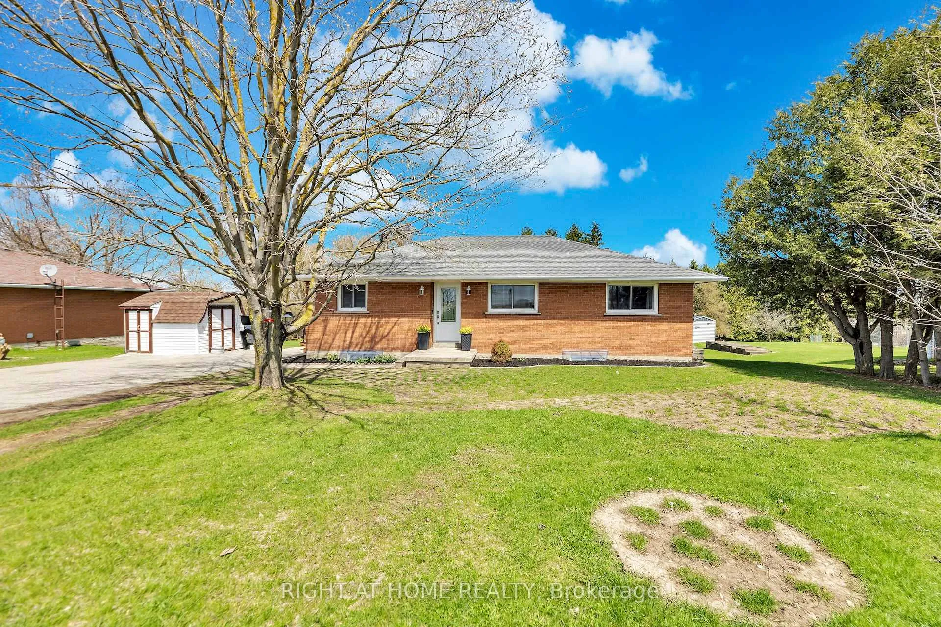 Front of 7629 Hwy 6, R.R. # 1