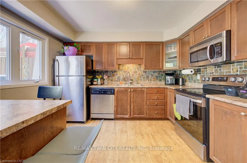 Photo 5 of Unit E34, 110 Activa Avenue, Kitchener — HOMEH