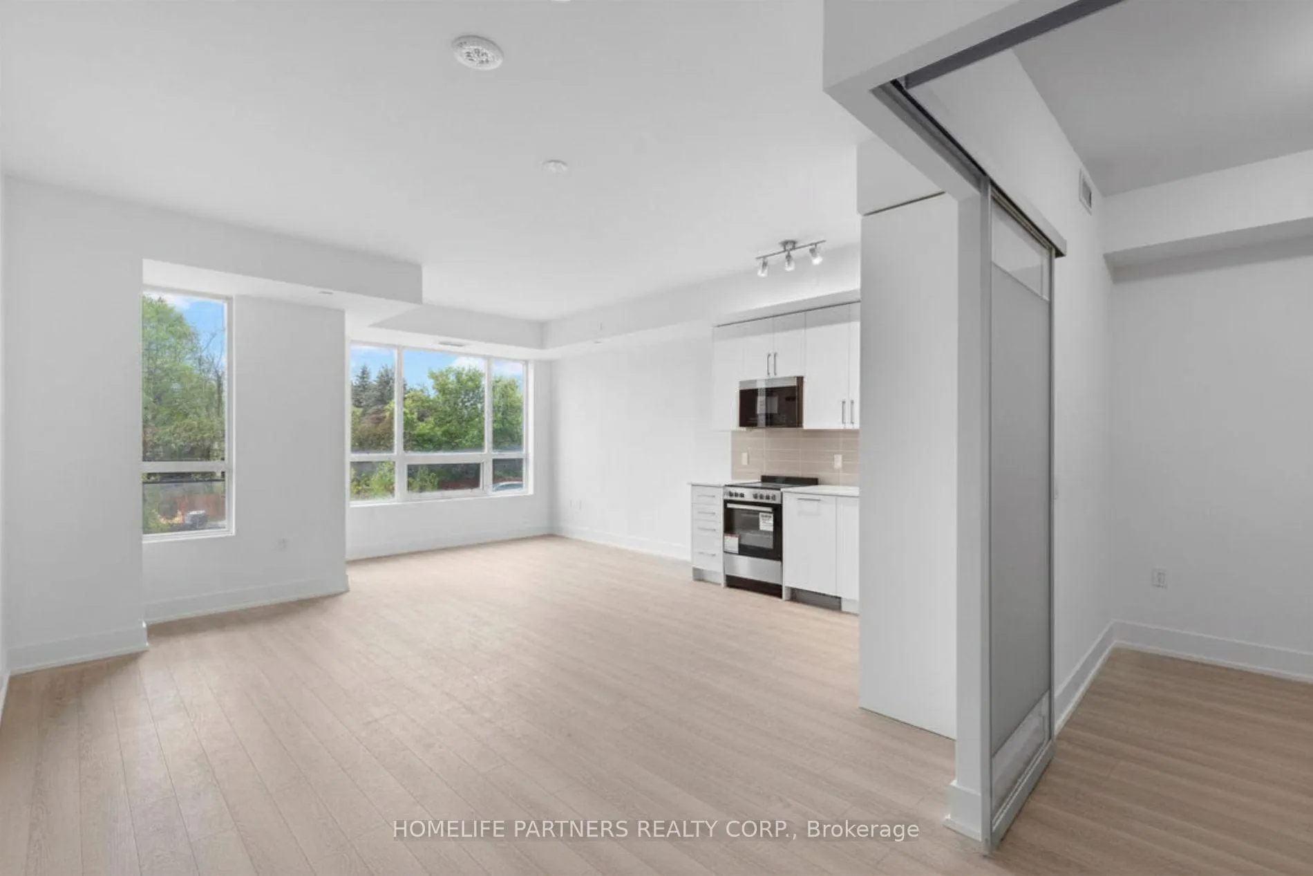 Photo 5 of Unit 206, 2075 King Road, King, King City — HOMEH