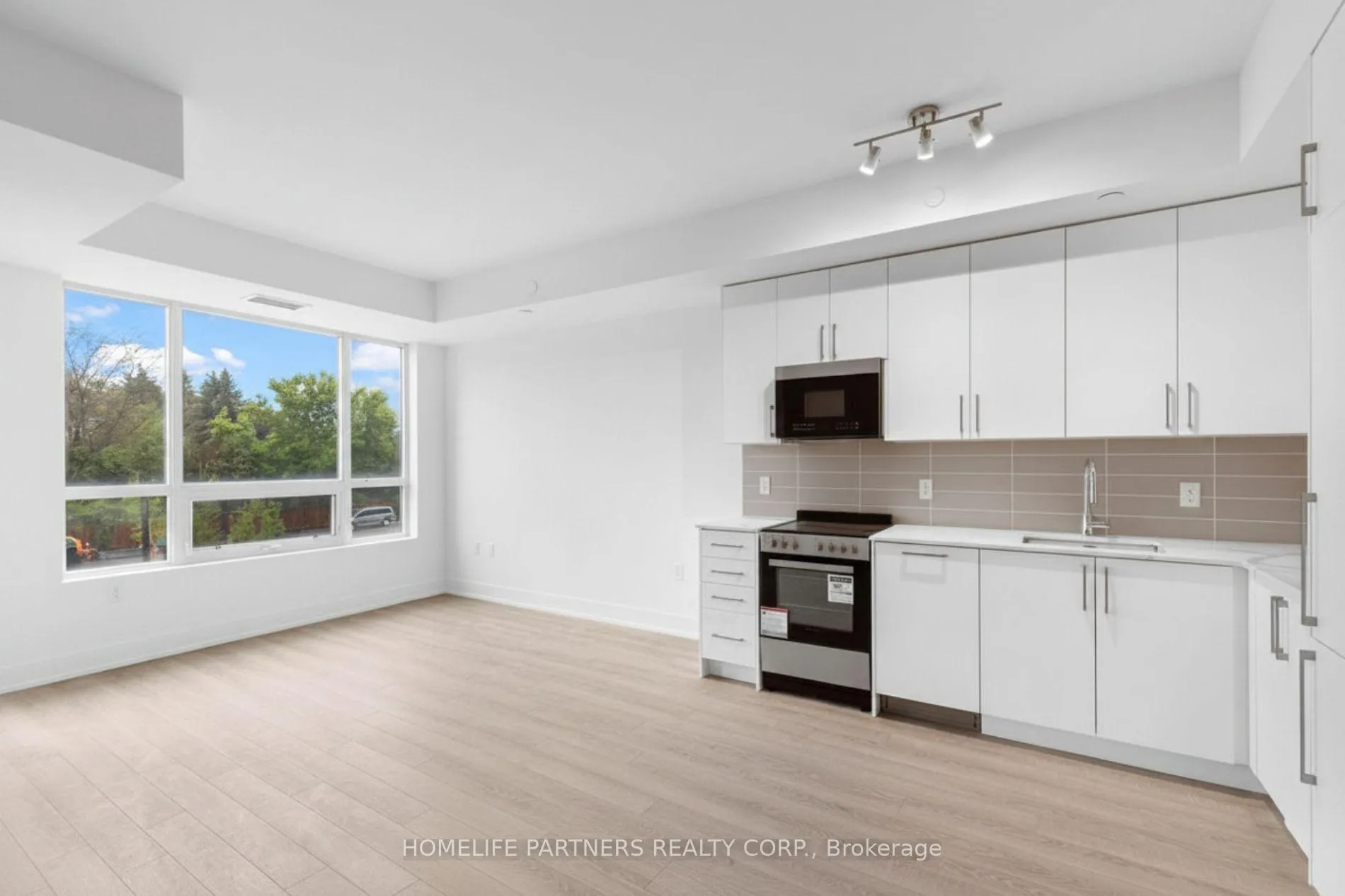 Photo 6 of Unit 206, 2075 King Road, King, King City — HOMEH