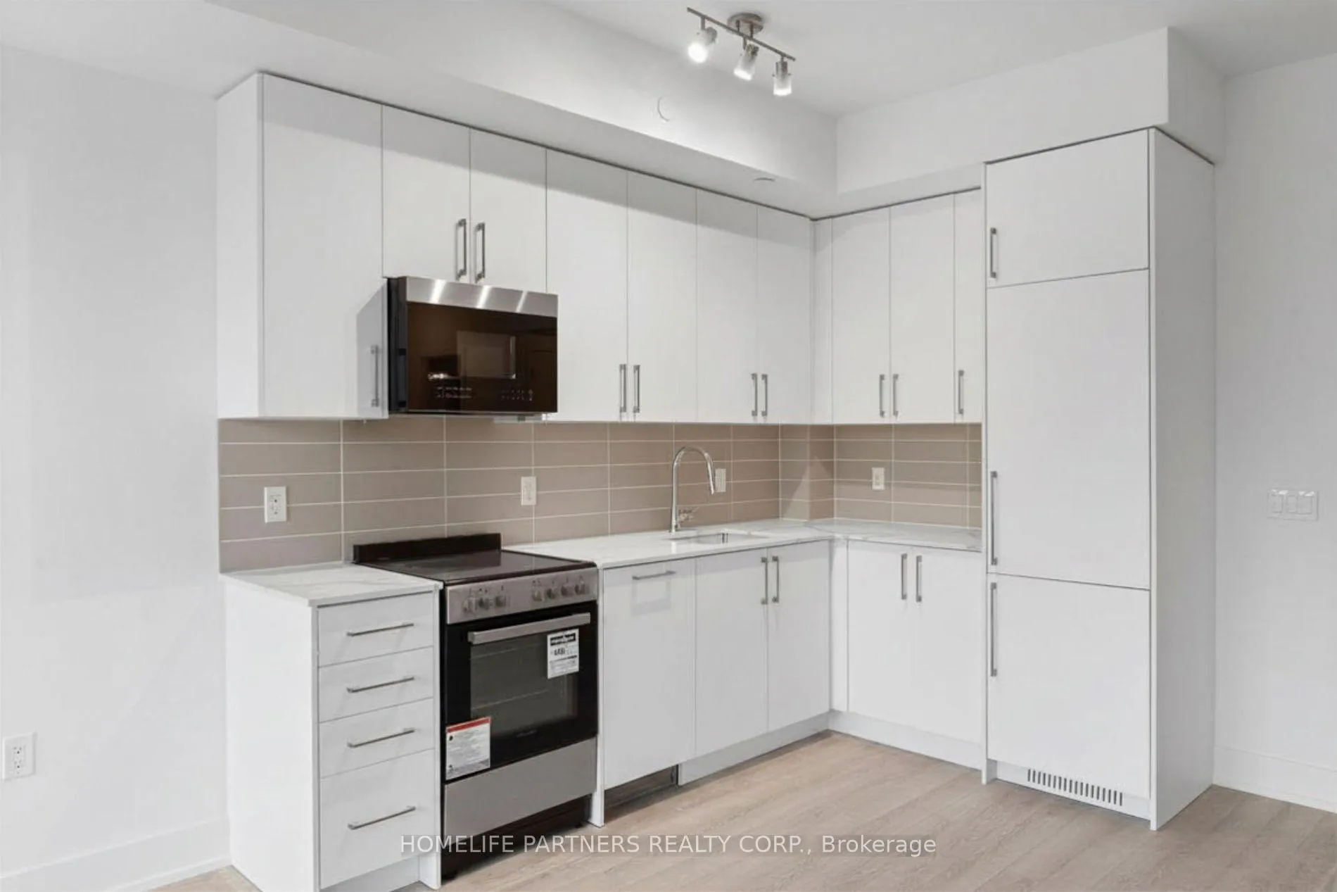 Photo 7 of Unit 206, 2075 King Road, King, King City — HOMEH