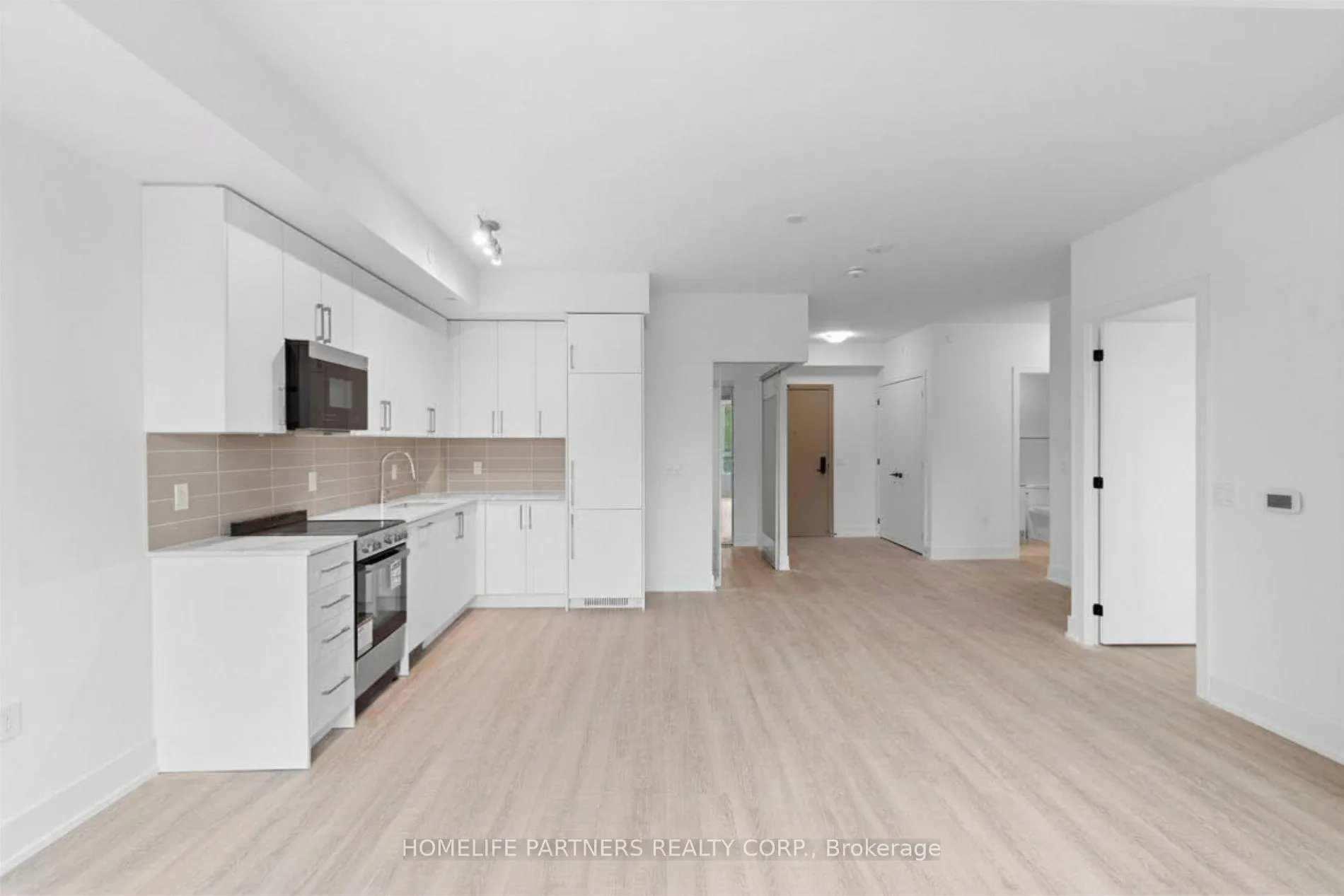 Photo 8 of Unit 206, 2075 King Road, King, King City — HOMEH