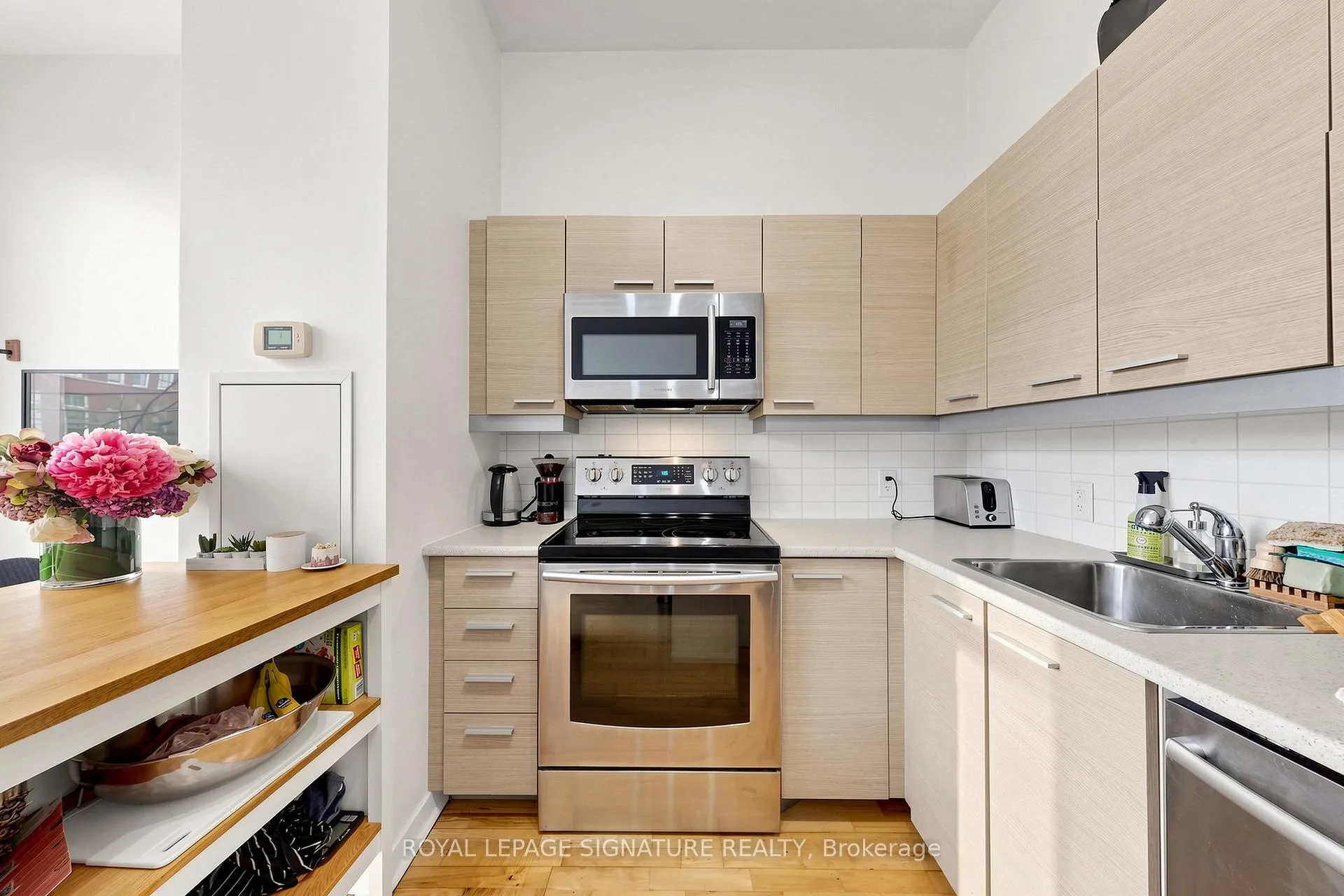 Photo 5 of Unit 203, 569 King Street E, Toronto, Moss Park — HOMEH
