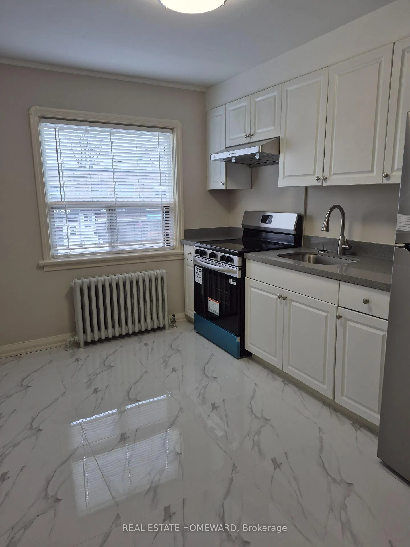 Photo 3 of Unit 4, 1066 Coxwell Avenue, Toronto, East York — HOMEH