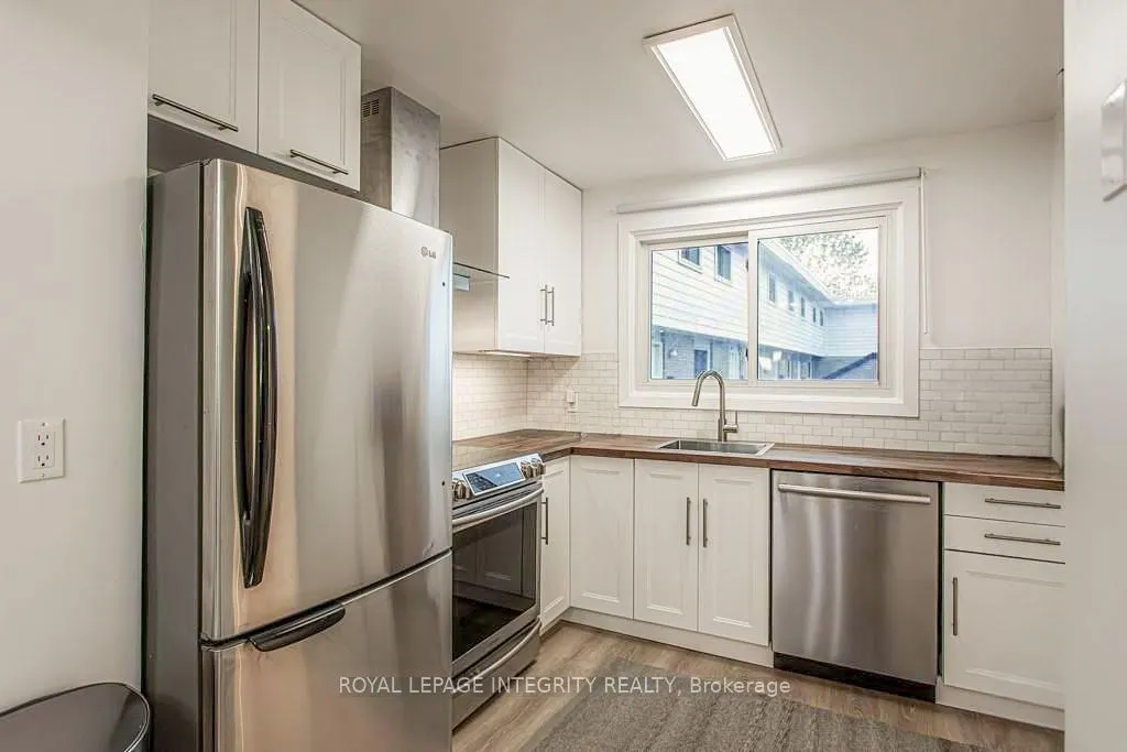 Photo 2 of Unit 1, 73 Hadley Circle, Ottawa, Bells Corners — HOMEH