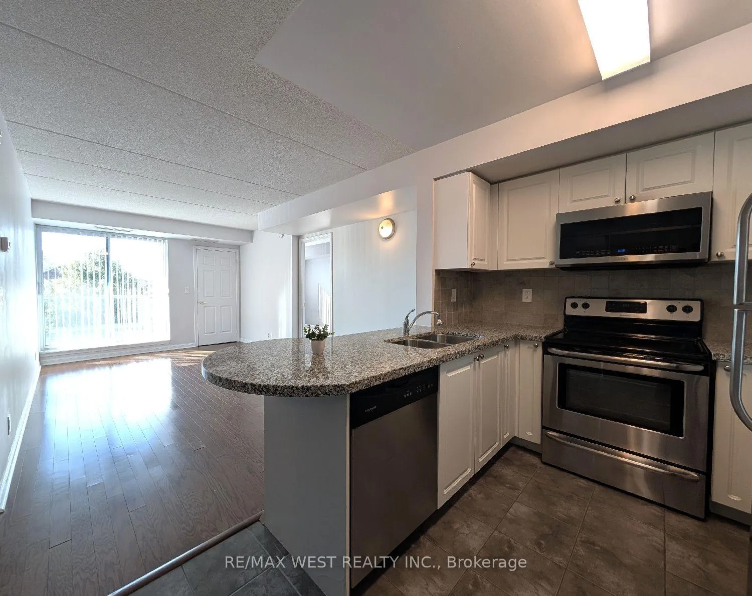 Photo 5 of Unit 203, 65 Via Rosedale, Brampton, Sandringham-Wellington — HOMEH