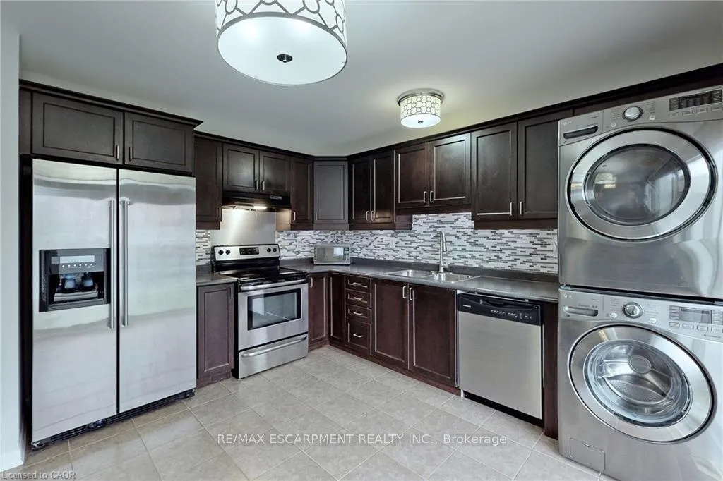 Photo 3 of Unit Main & Upper, 1005 Farmstead Drive, Milton, Willmott — HOMEH