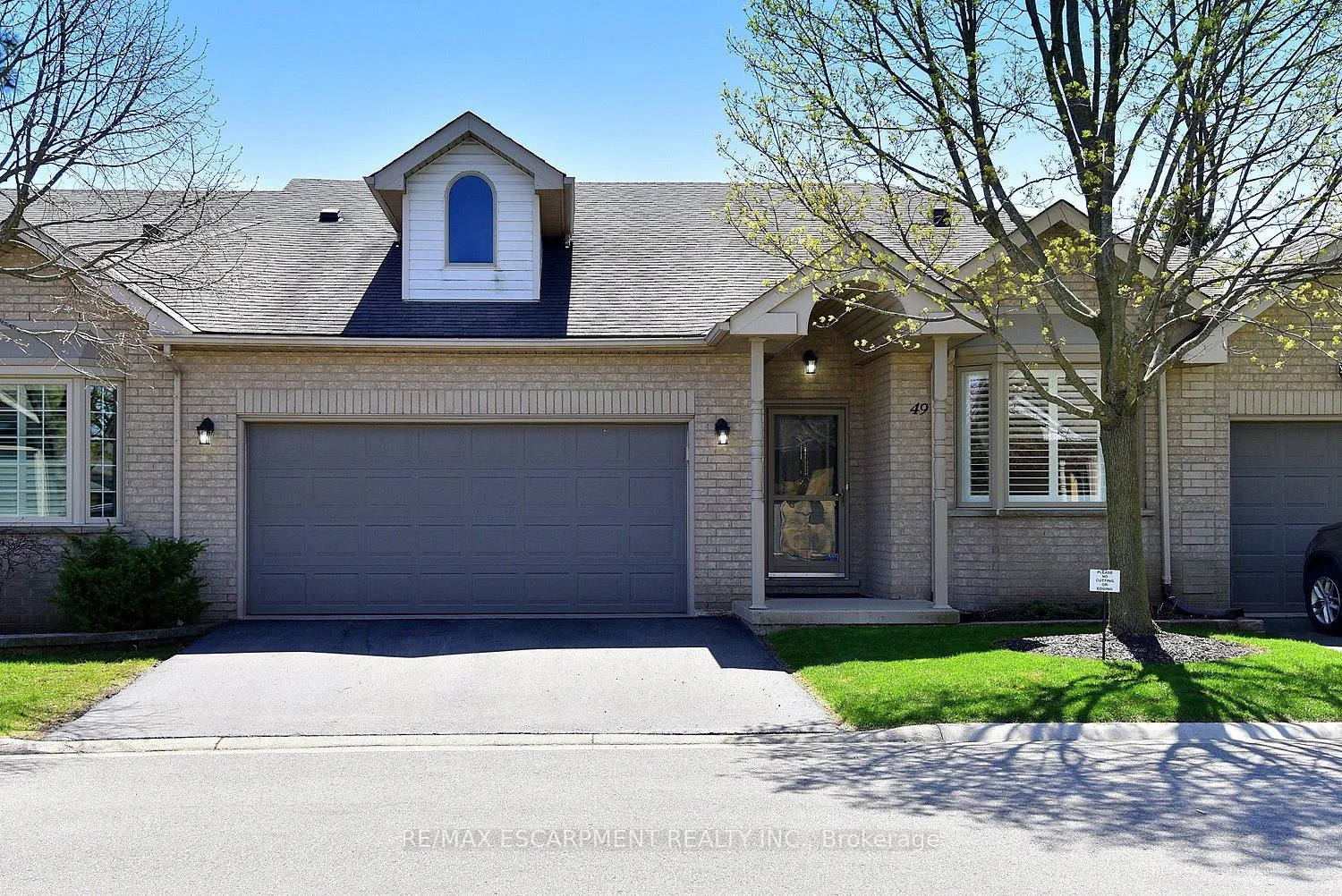 Front of 49 Riveroaks Drive