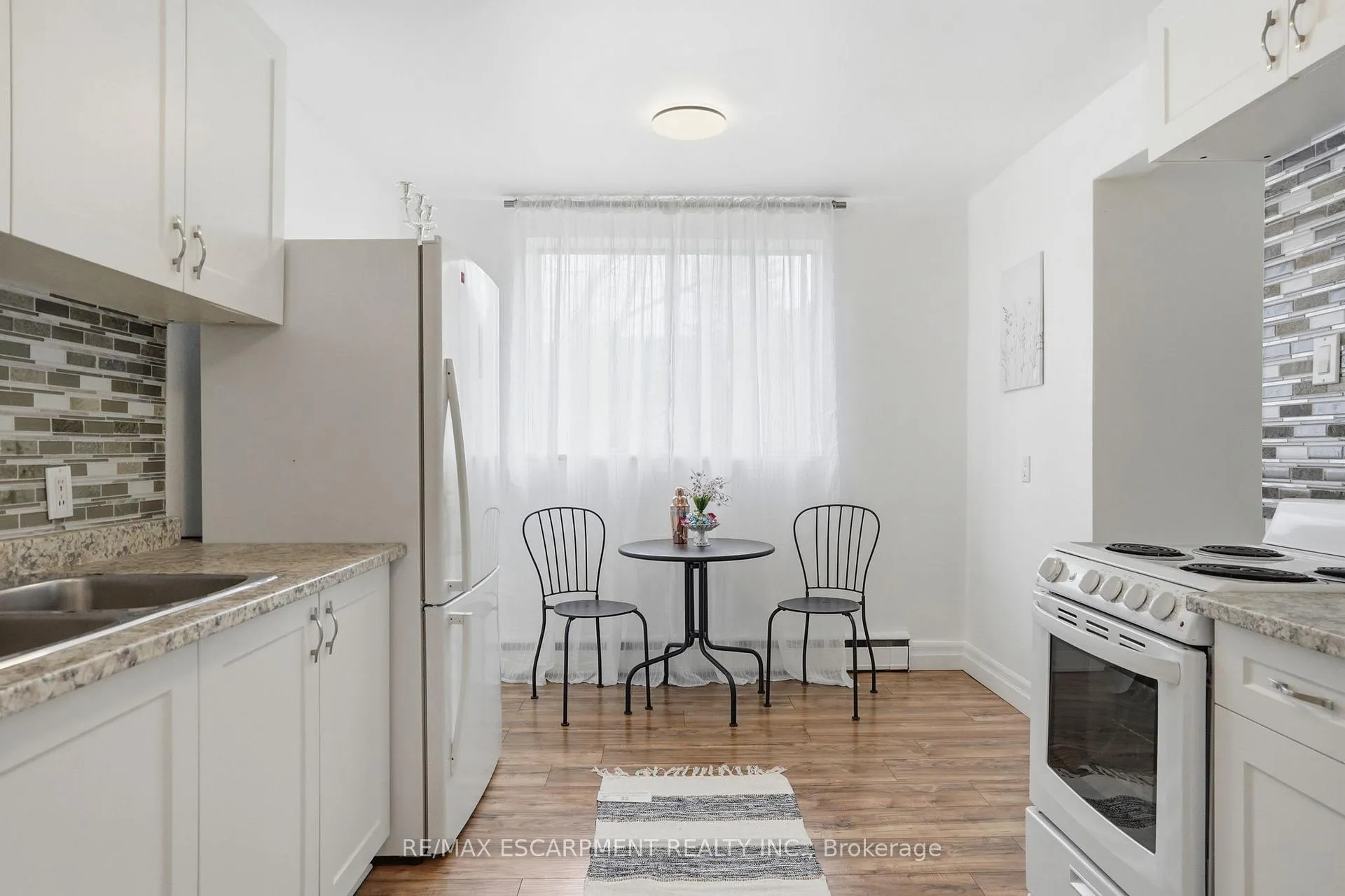 Photo 6 of Unit 5, 36 Ray Street S, Hamilton, Strathcona — HOMEH