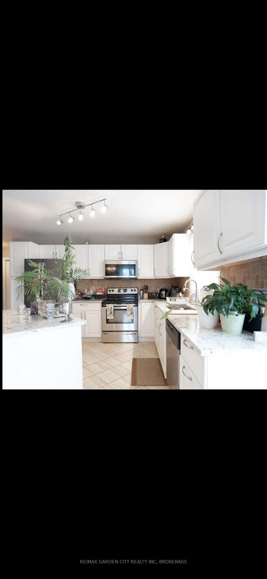 Photo 5 of Unit 4, 7370 Monastery Drive, Niagara Falls, Mt. Carmel — HOMEH