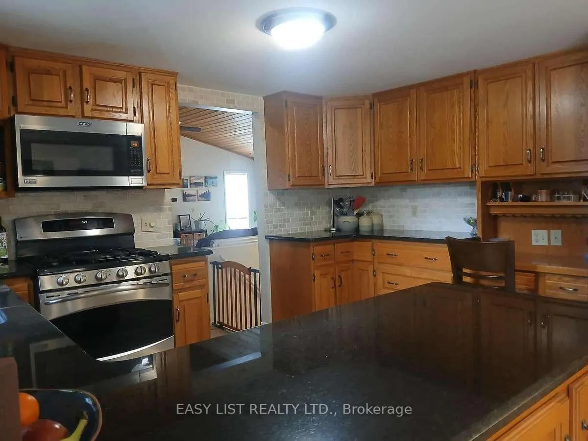 Photo 16 of 7652 Harris Point Drive, Plympton-Wyoming, Plympton Wyoming — HOMEH