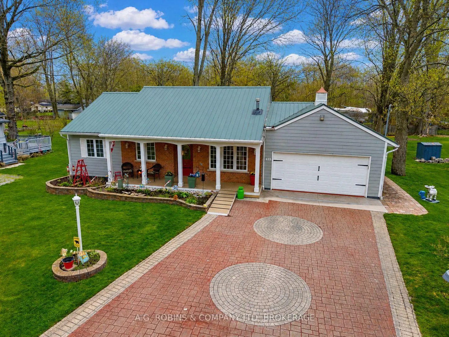 Front of 633 Wyldewood Road
