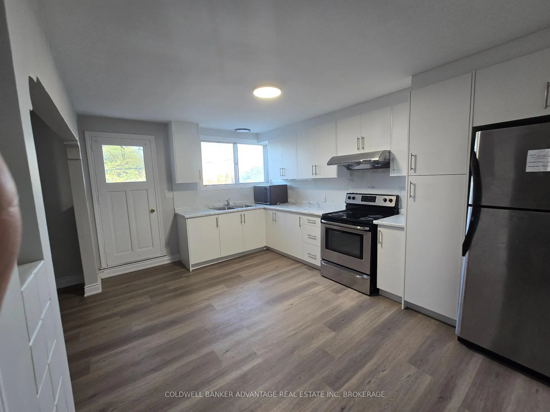 Photo 4 of Unit 1, 936 East Main Street, Welland, Welland Downtown — HOMEH