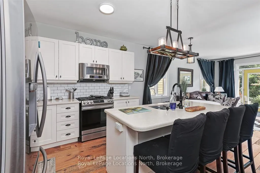 Photo 7 of 35 Sandy Coast Crescent, Wasaga Beach — HOMEH