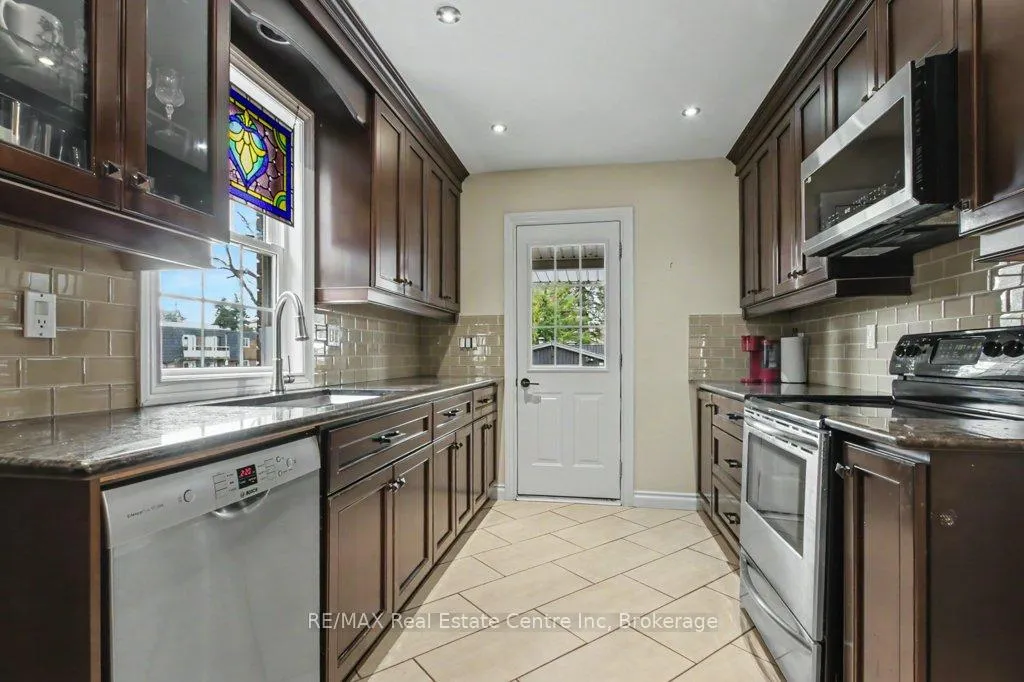Photo 12 of 598 Woolwich Street, Guelph, Exhibition Park — HOMEH