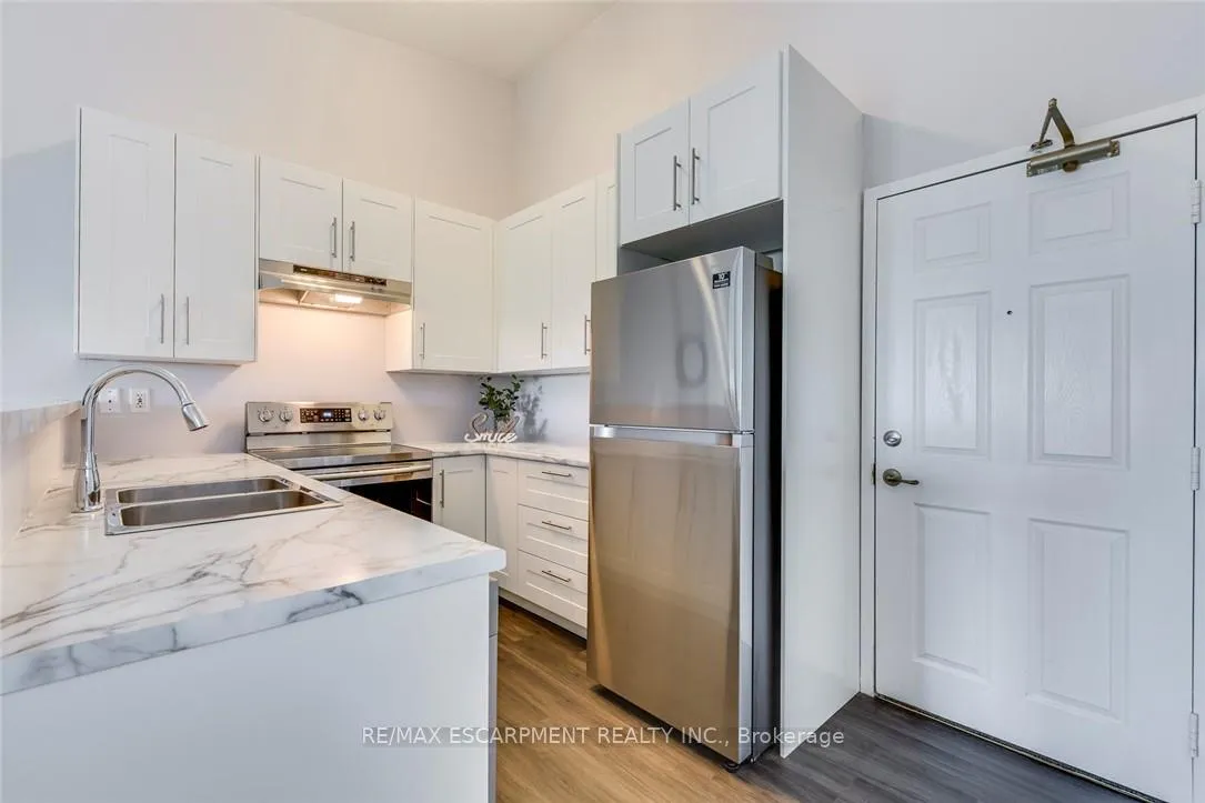 Photo 5 of Unit 403, 2055 Appleby Line, Burlington, Uptown — HOMEH