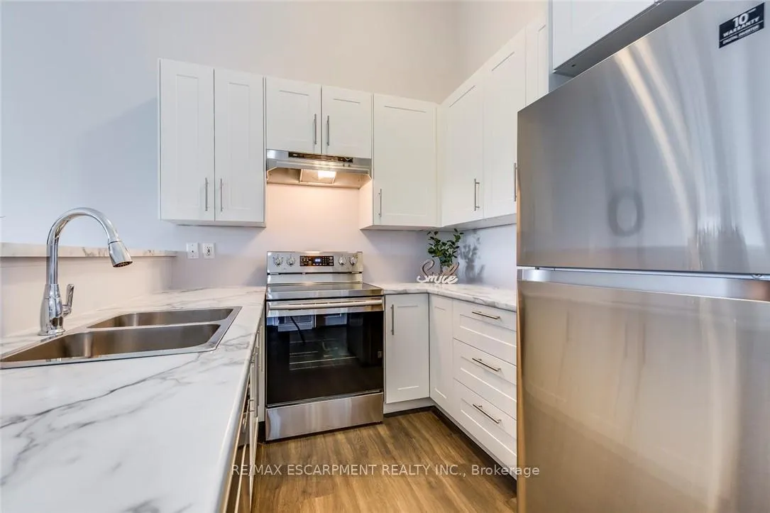 Photo 8 of Unit 403, 2055 Appleby Line, Burlington, Uptown — HOMEH