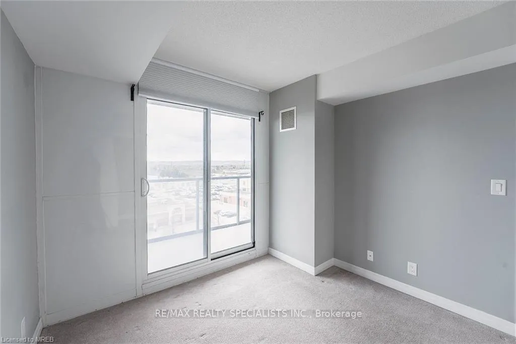 Photo 6 of Unit 705, 1940 Ironstone Drive, Burlington, Uptown — HOMEH
