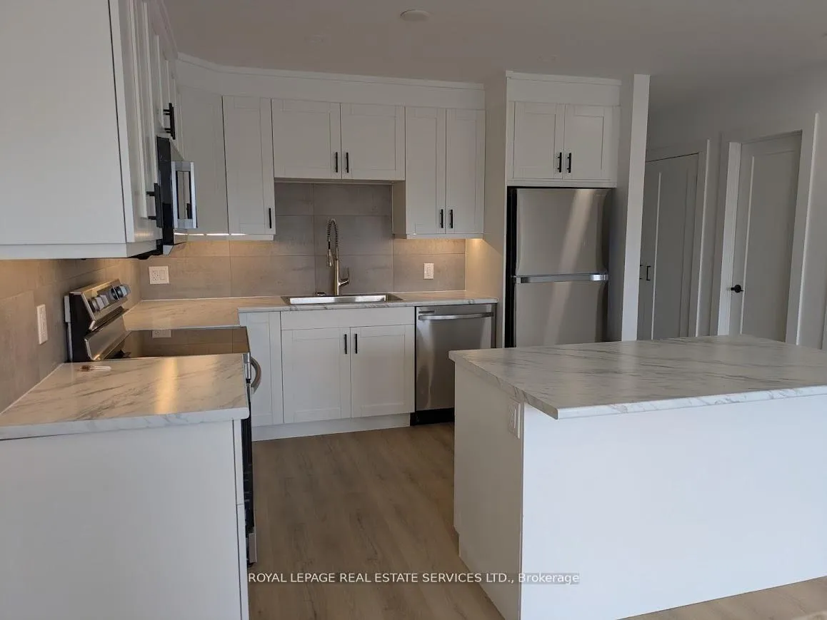 Photo 2 of Unit Upper, 272 Lakeshore Road E, Mississauga, Port Credit — HOMEH