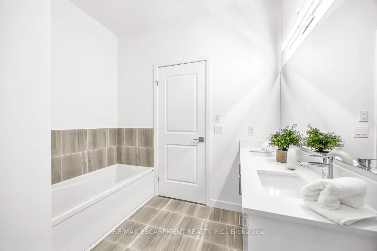 Photo 21 of Unit 407, 7549A Kalar Road, Niagara Falls, Brown — HOMEH