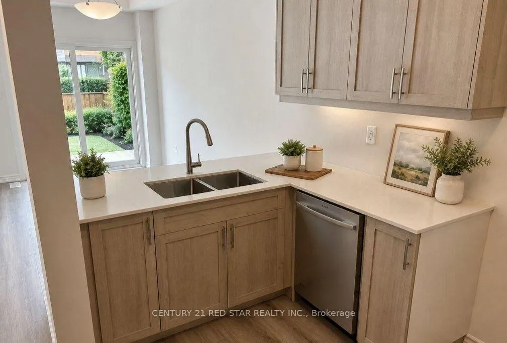 Photo 4 of Unit 102, 461 Blackburn Drive, Brantford — HOMEH