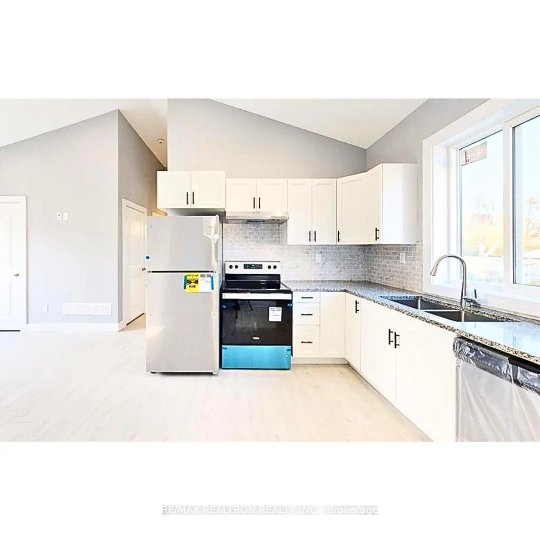 Photo 5 of 77 Godfrey Drive, London, East D — HOMEH