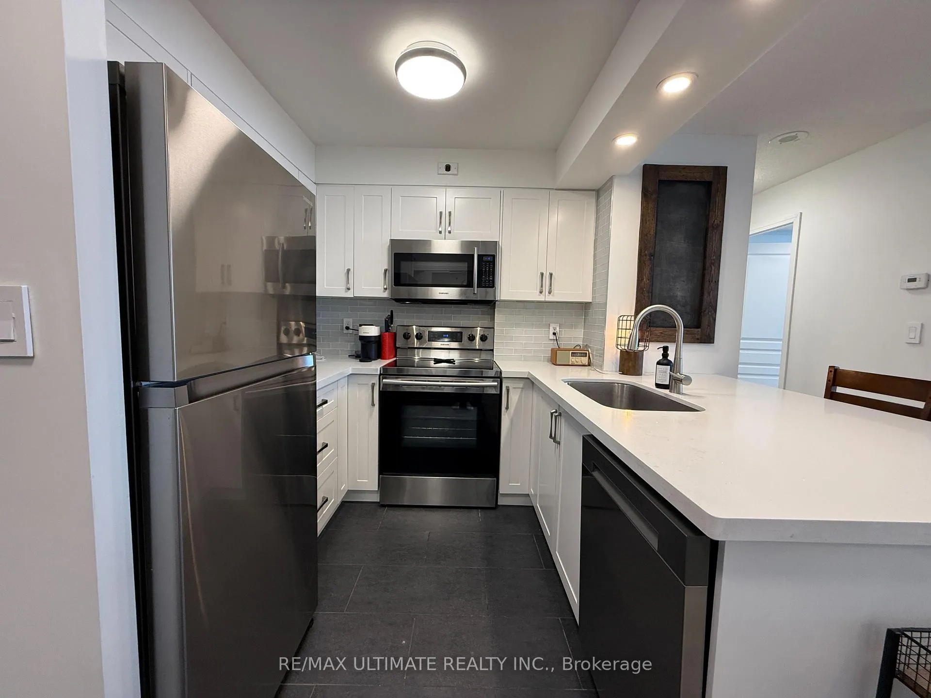 Photo 1 of Unit 312, 1765 Queen Street E, Toronto, The Beaches — HOMEH