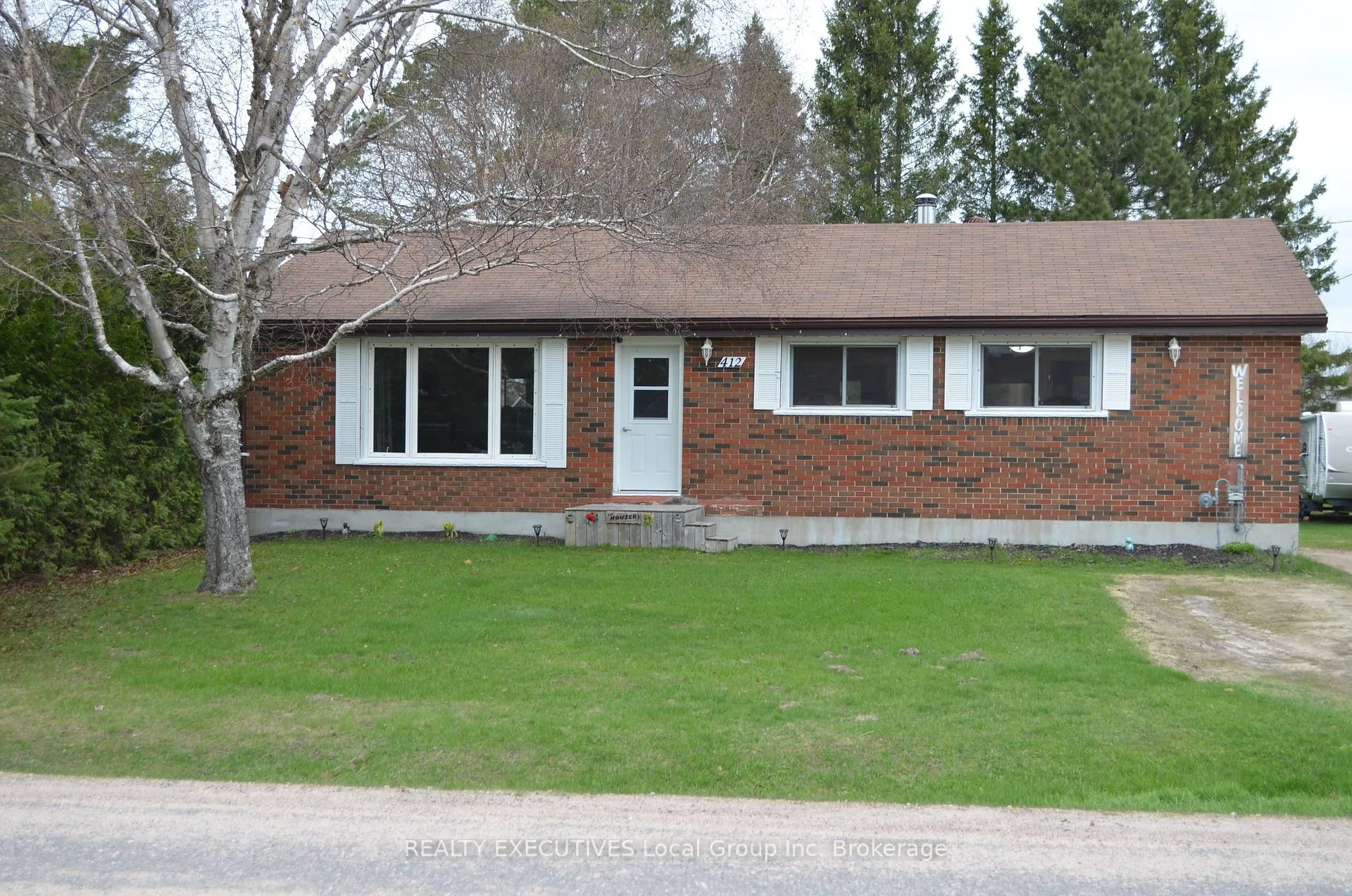 Photo 1 of 412 Sweezy Street W, Powassan, Trout Creek — HOMEH